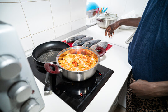 Cooking food in the kitchen.