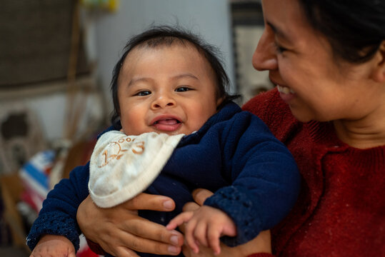 Mexican Baby and mother happy portrait