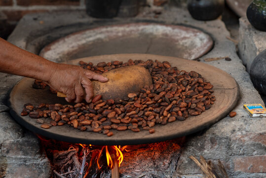 Close up cocoa beans toasting process