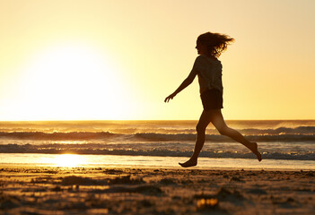 Happy, woman and running at beach for sunset, journey and freedom vacation in nature for mockup....