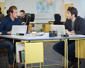 Men, professional and workers with laptop for teamwork, partnership or collaboration for digital search in company. Office, workspace with working colleagues and technology for online website design