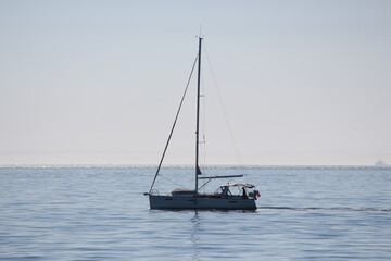 small ship in the sea of marmara with a sail 
