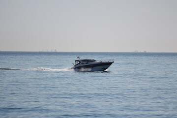 small ship in the sea of marmara with a sail 