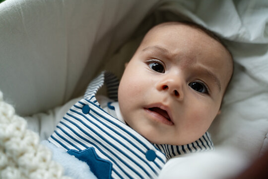 Baby Contemplating with a Serious Gaze