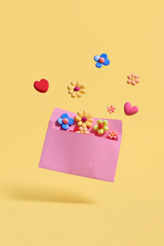 An open envelope surrounded by daisy flowers and hearts