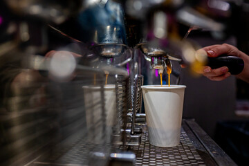 Skilled barista crafting a perfect cup of coffee, capturing the cozy café atmosphere as espresso pours into the cup