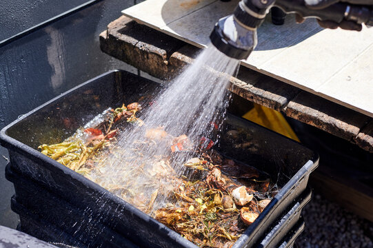 Wetting down organic worm farm