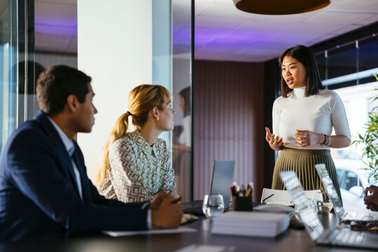 Financial advisors having a meeting in office