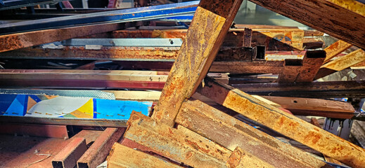 scrapyard where rusted profiles and scrap iron are thrown away
