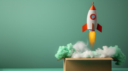 Creative concept of a toy rocket taking off from a cardboard box against a green background