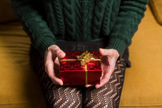 Anonymous woman holding special gift