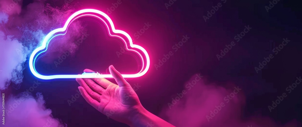 Poster a hand holding up an illuminated neon cloud symbol against a dark background, representing the conce