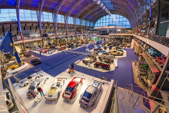 Autoworld, Brussels, Belgium. Tourist attraction in the city. Large warehouse museum with a display of old cars and motorcycles.