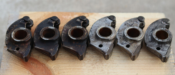 Old original rockers, three washed and three dirty covered with a layer of black soot.