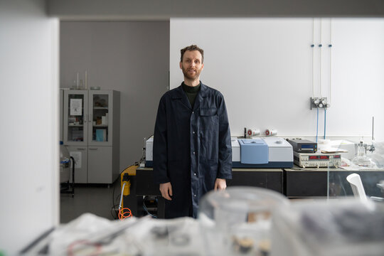 Male Researcher At Bright Lab Room