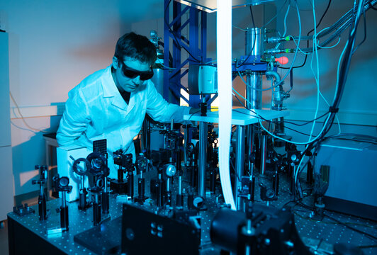 Male Researcher Using Laser Technologies