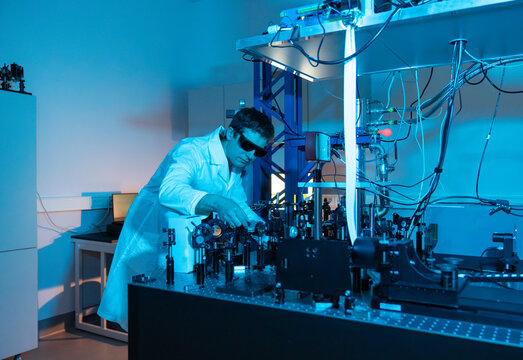 Male Researcher Using Laser Technologies