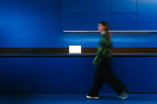 A laptop with white screen in the kitchen