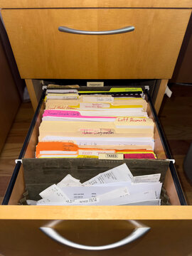 Tax Receipts in in file folder in file cabinet 