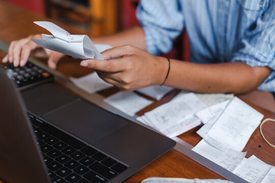woman organizing recepits at her small business