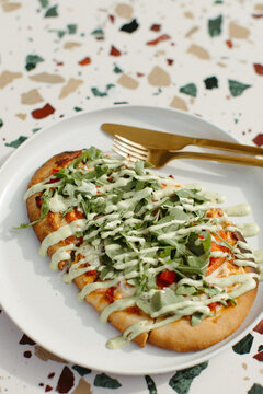 Green Goddess Flatebread on Terrazzo table 
