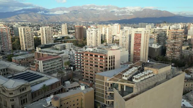 Urban Panorama of Santiago Center with Santa Lucia and Andean Mountains Backdrop