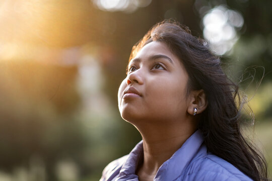 Facial expression of a young lady at afternoon light