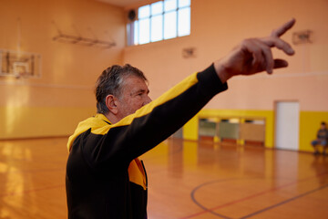 Portrait of a coach follows the game