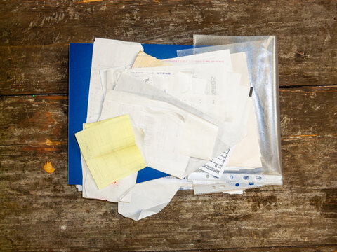 messy receipts on table 