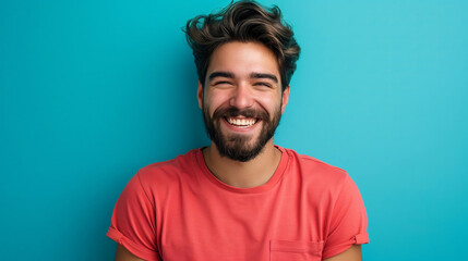 Joyful Young Hispanic Man with a Beard, Casual Red Tee, Exuberant Smile