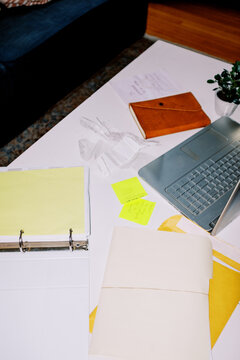 messy ugc lo-fi direct flash of office mess receipts and paperwork