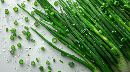 
Fresh green onions on a white background with space for text banner, cover, print. Finely chopped green onions, greens for salads and dishes, spices. Culinary background. Spring greens salad.