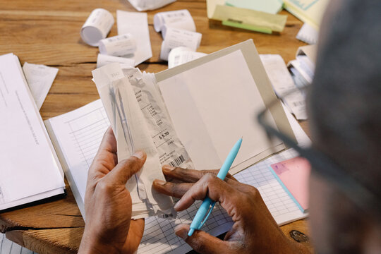 Person doing accounting equation 
