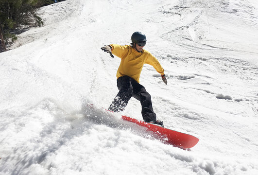 Snowboarder Slashin' Spring Snow