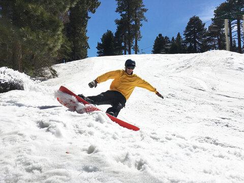 Snowboarder Slashin' Spring Snow