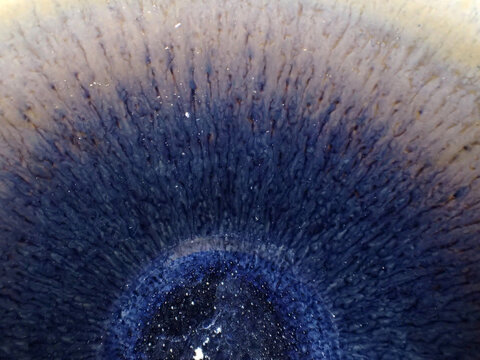 Textured background of microscopic glaze of Chinese ceramics tea cup