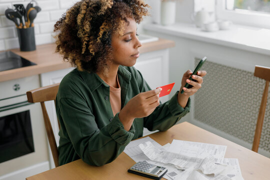 Person counts and pays the receipts.