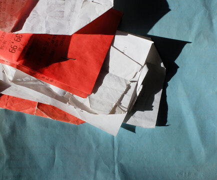 Flatlay Receipts on a Blue Background
