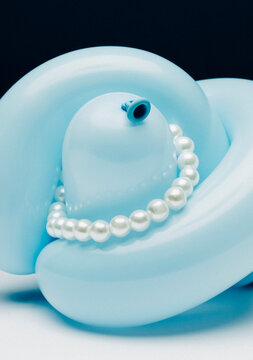 Pearl necklace on blue  balloon