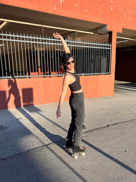 Woman Roller Skating with Long Shadow