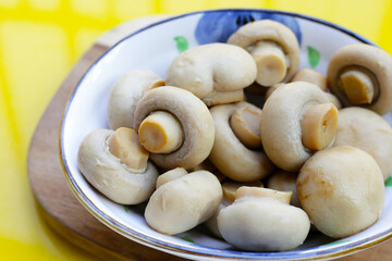 Champignon mushrooms in brine. Canned champignon mushrooms whole