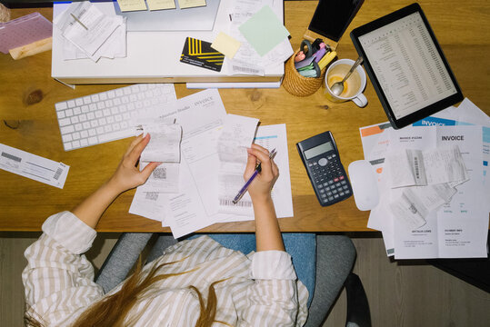 Woman doing the taxes of her business