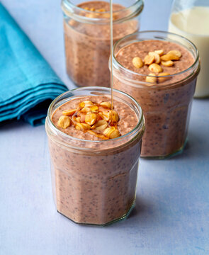 Chocolate and chia overnight oats in jars, meal prep.