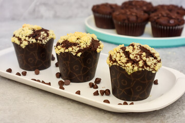 Chocolate muffin or cupcake with crumble topping