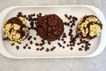 Chocolate muffin or cupcake with crumble topping