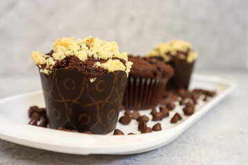 Chocolate muffin or cupcake with crumble topping