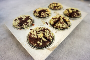 Chocolate muffin or cupcake with crumble topping