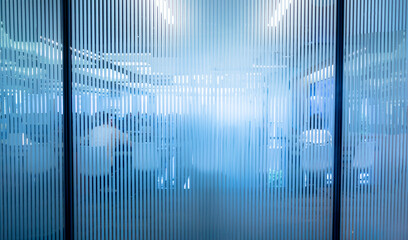 Modern office  interior with frosted glass texture and thin lines in blue tones.