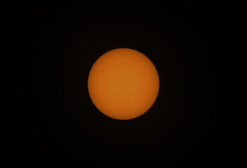 The Sun in visible light with sunspot, April 2024. During solar maximum, large numbers of sunspots appear	