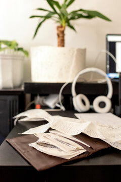 Messy workplace with receipts